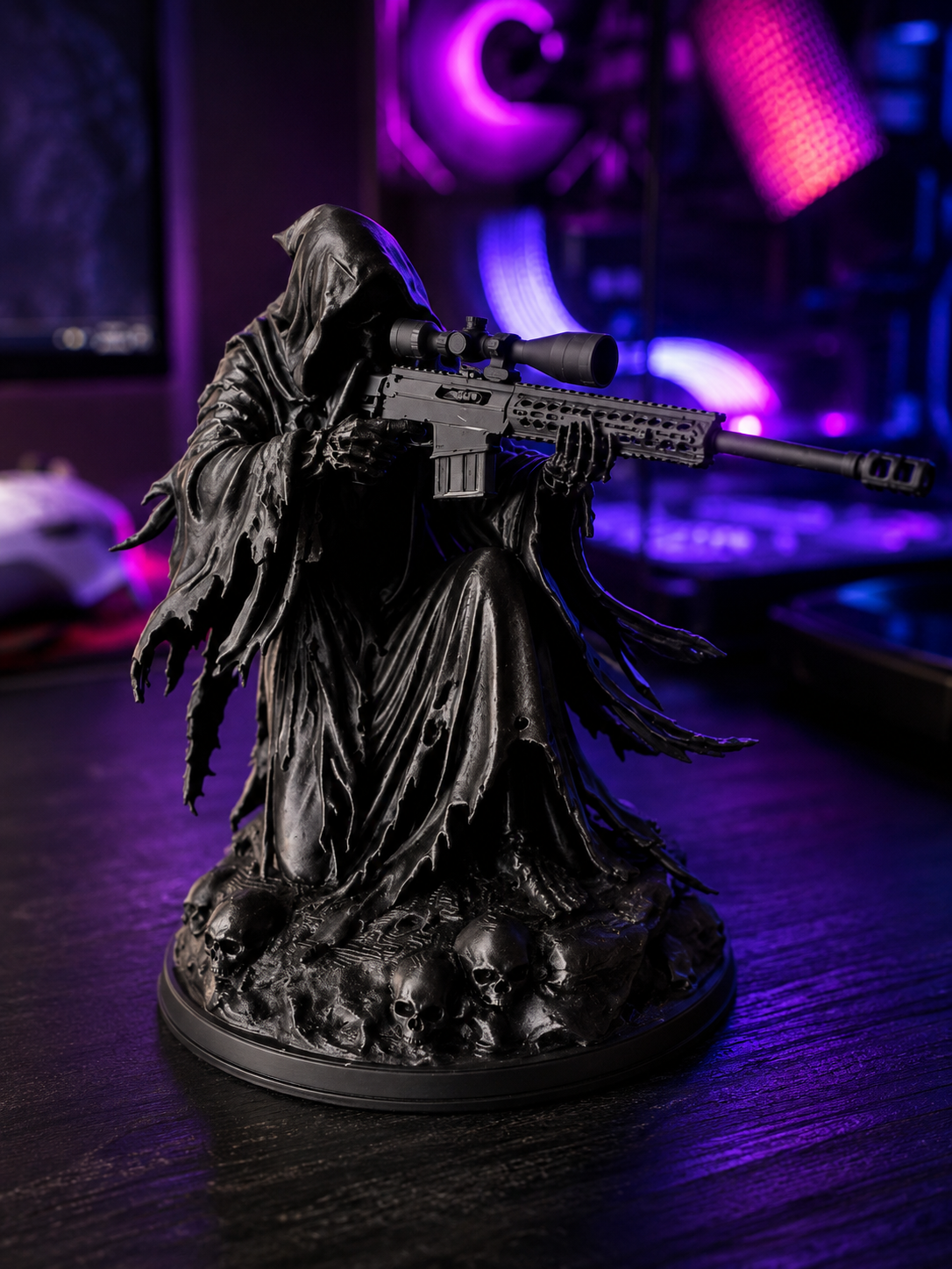 3D printed matte black Grim Reaper statue aiming a scoped sniper rifle, standing on a base of skulls